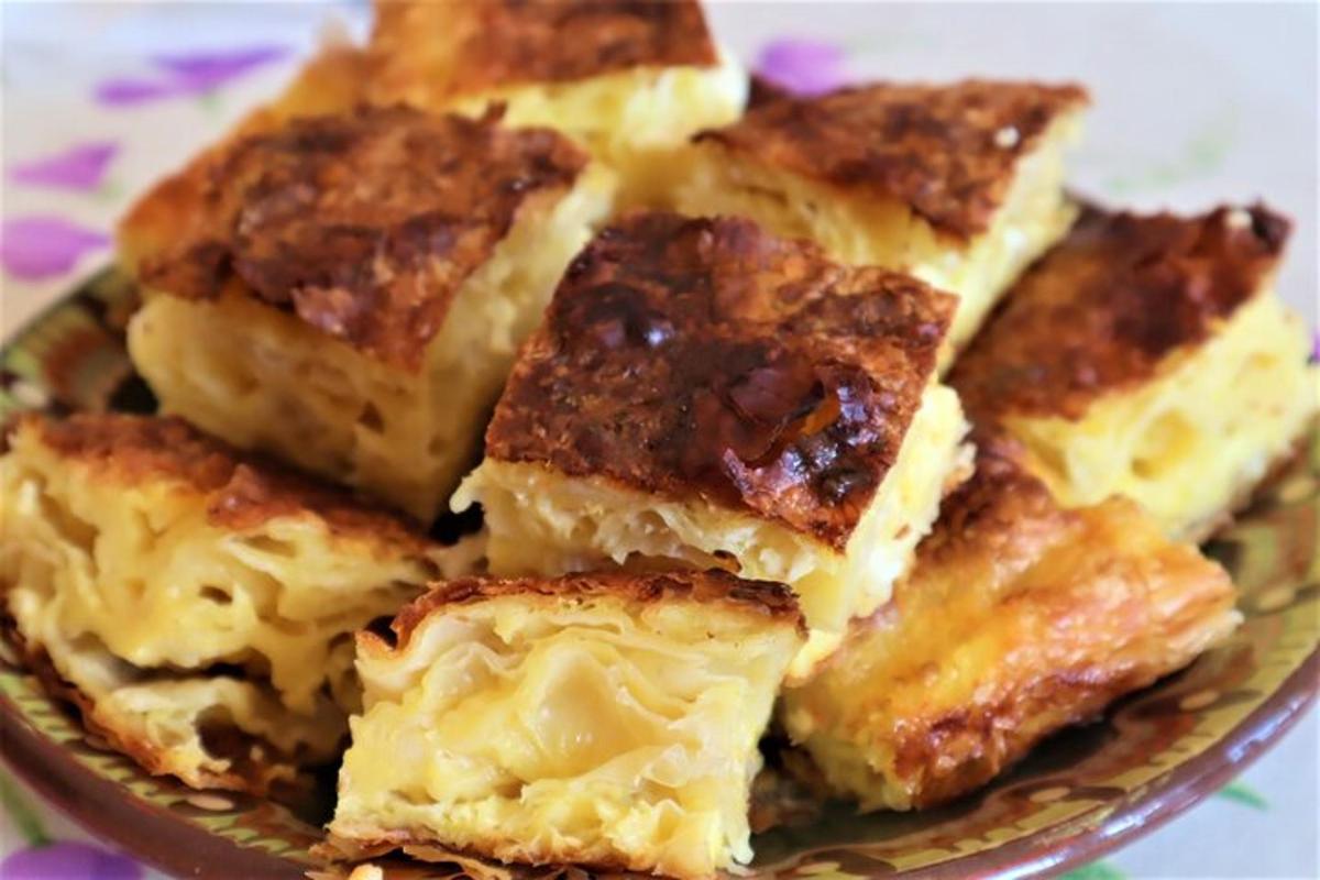 hromada jídla ležící na talíři