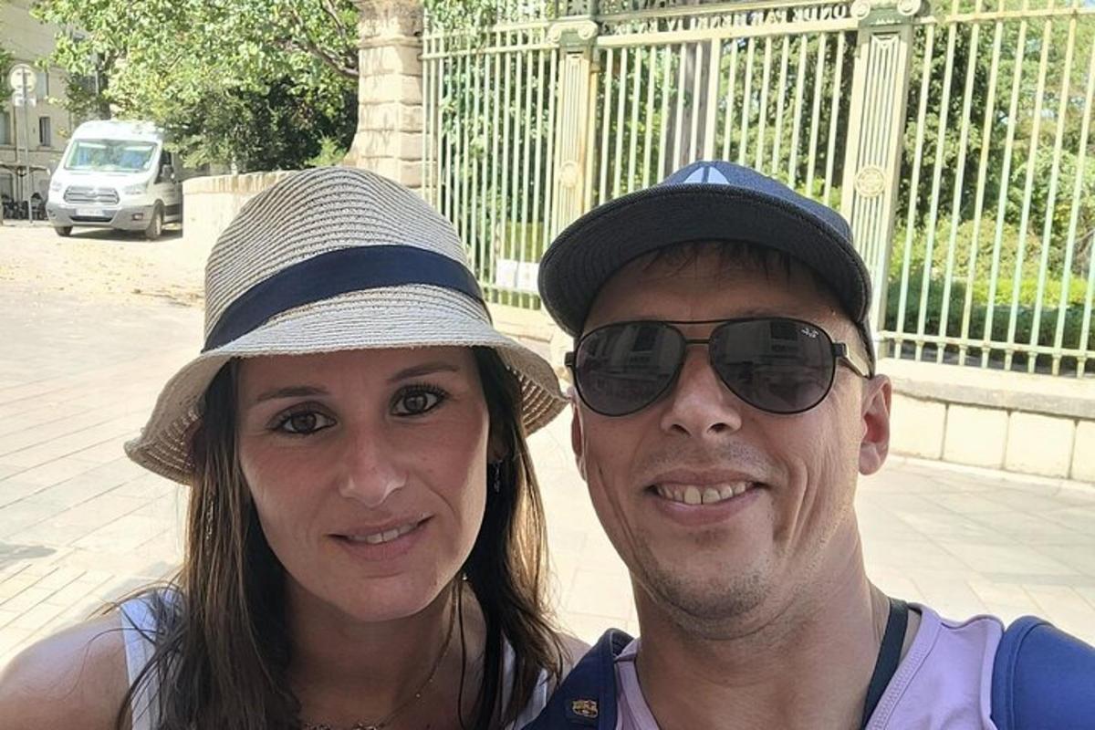a man and a woman posing for a picture