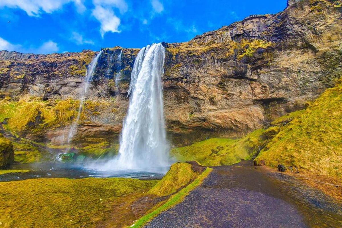 a waterfall on the side of a mountain