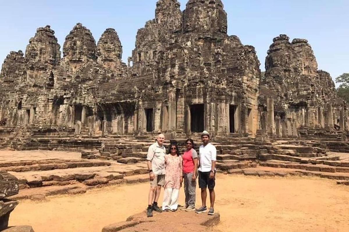 a group of people standing in front of a temple