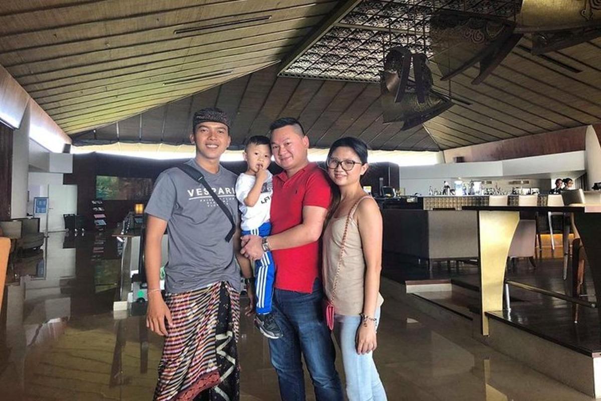 a family posing for a picture in a restaurant