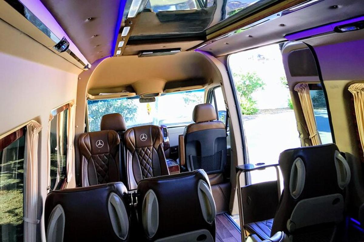 an inside view of a bus with empty seats