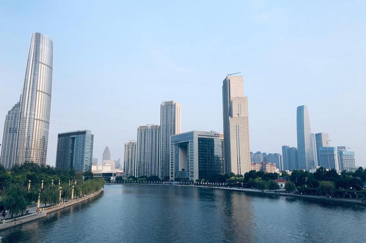 a river in a city with tall buildings