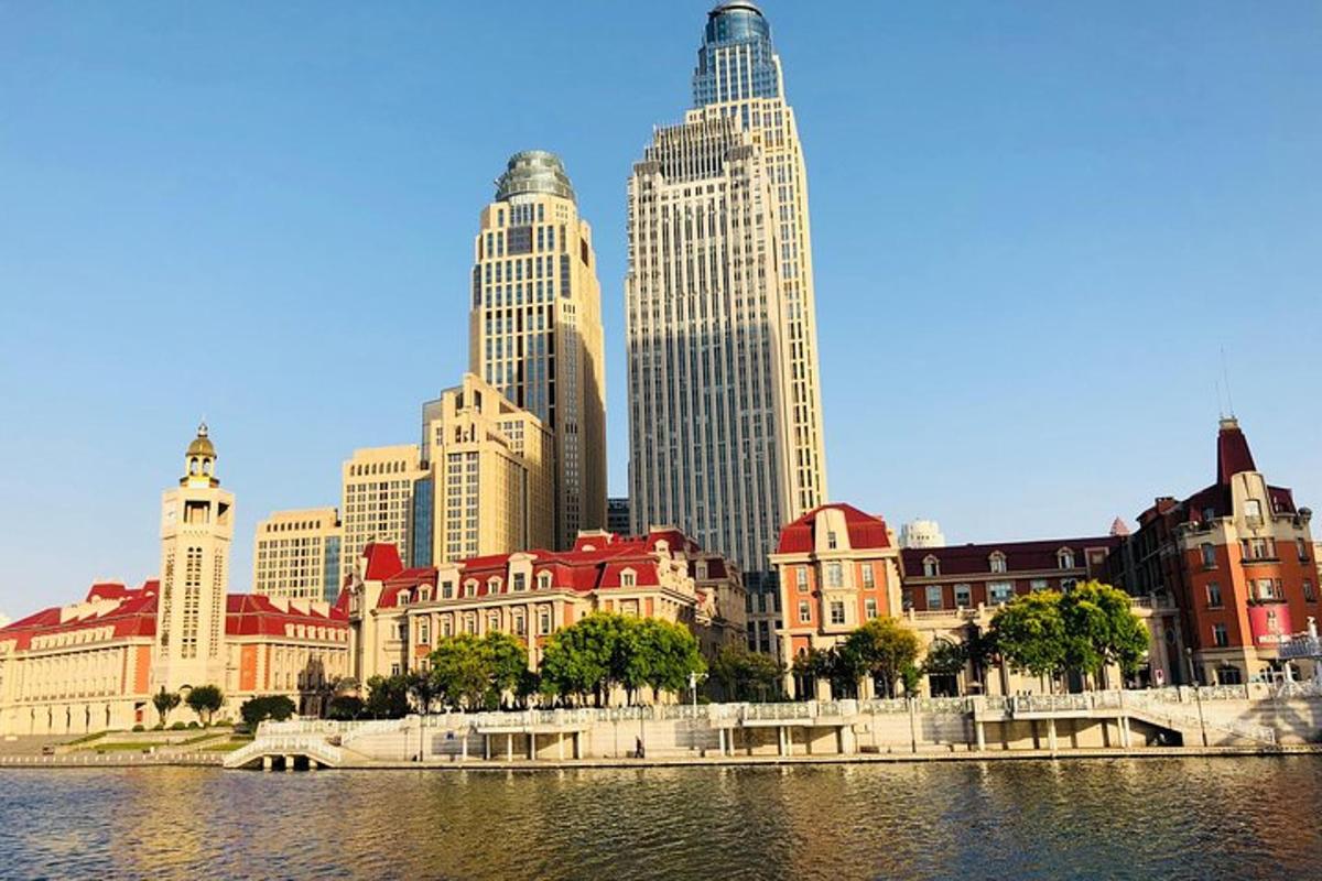 a view of a city with tall buildings and a river