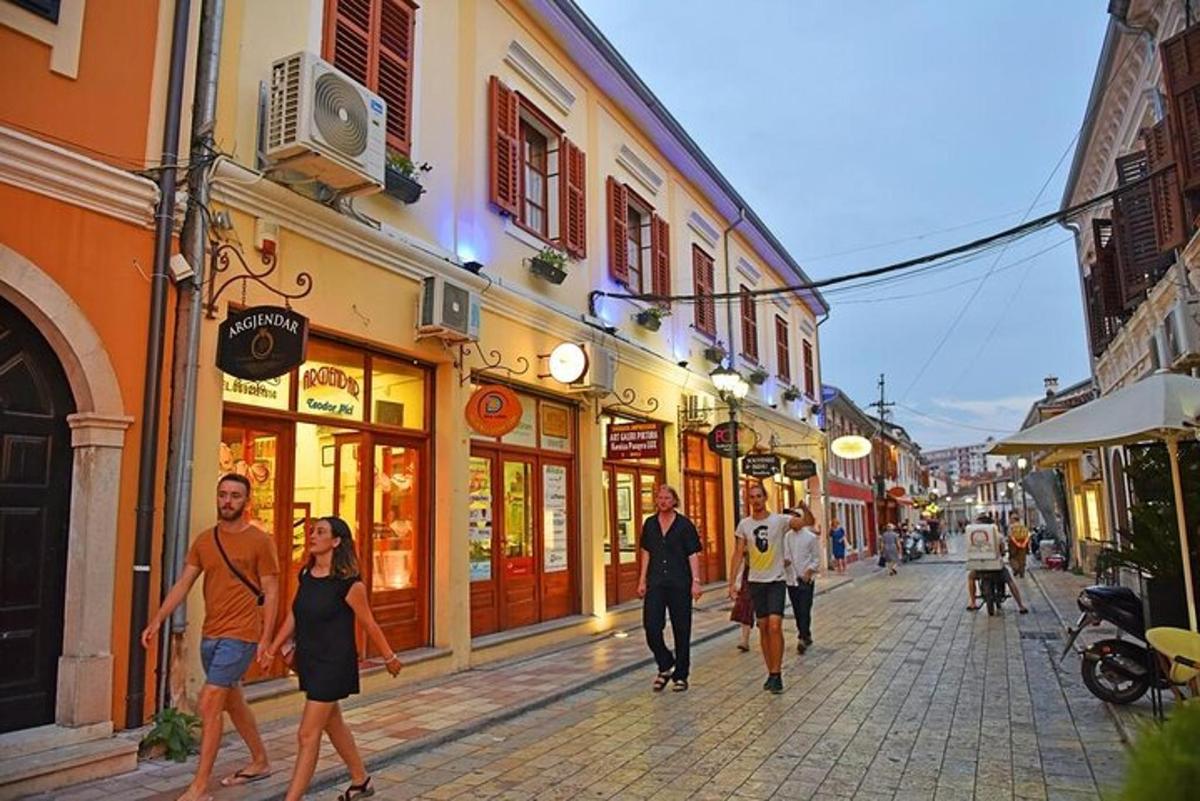 a group of people walking down a street