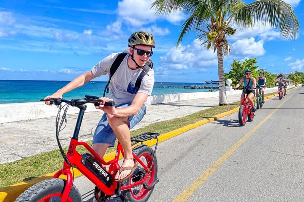 a group of people riding bikes down a street