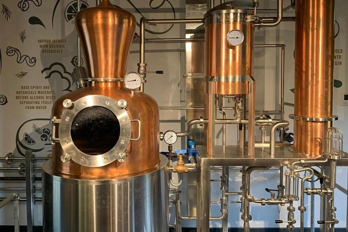 a brewery with two large gold and silver tanks