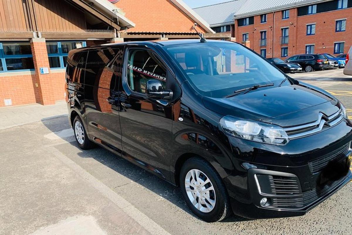 a black van parked in a parking lot
