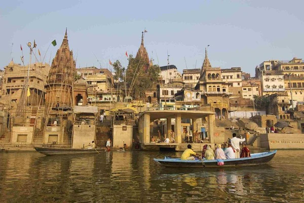 a group of people on a boat in the water