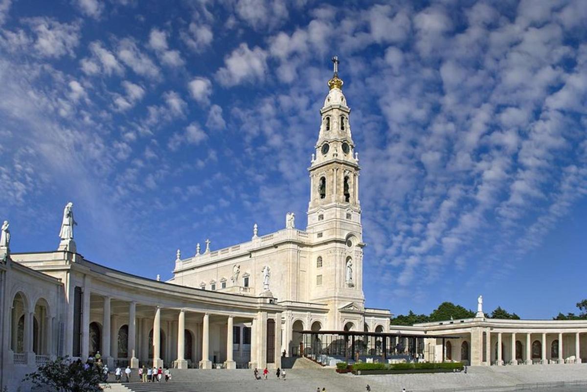 a large white building with a tower on top of it