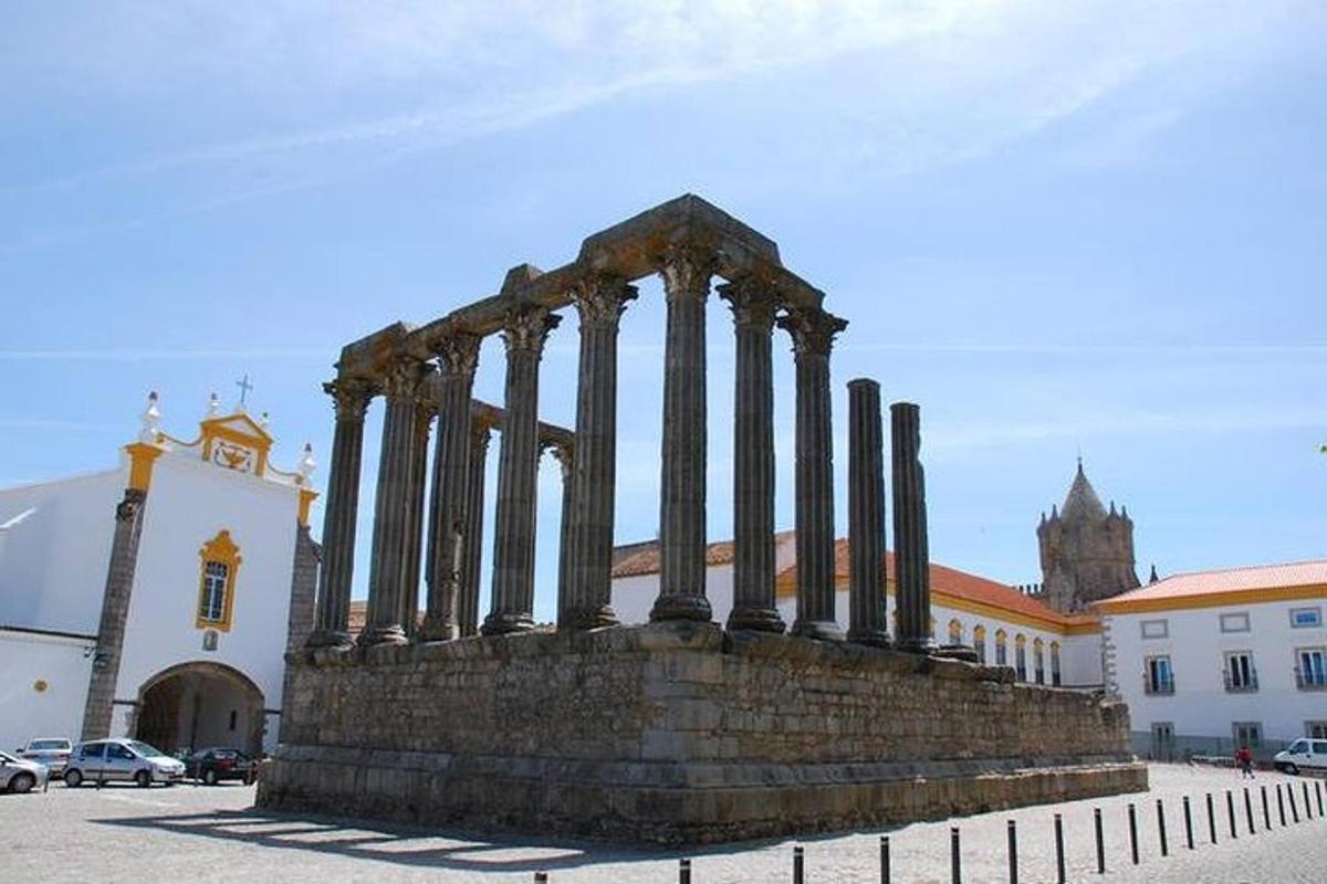 a group of pillars in front of a building