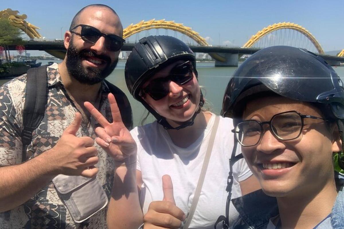 a group of three people giving the peace sign