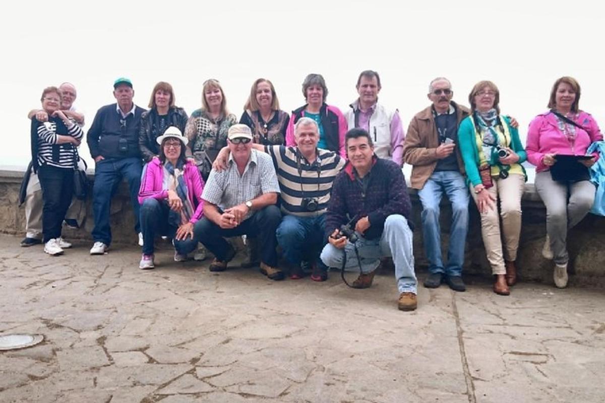 a group of people are posing for a picture