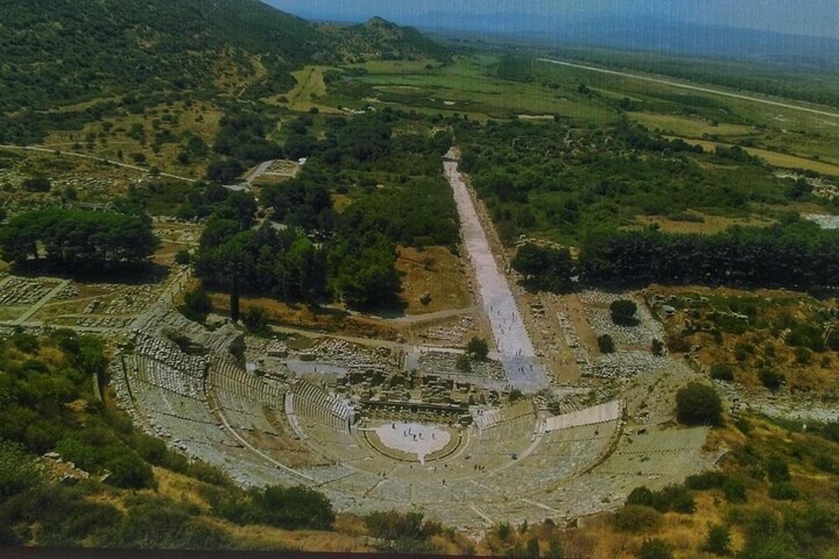 an aerial view of an amphitheater in a field