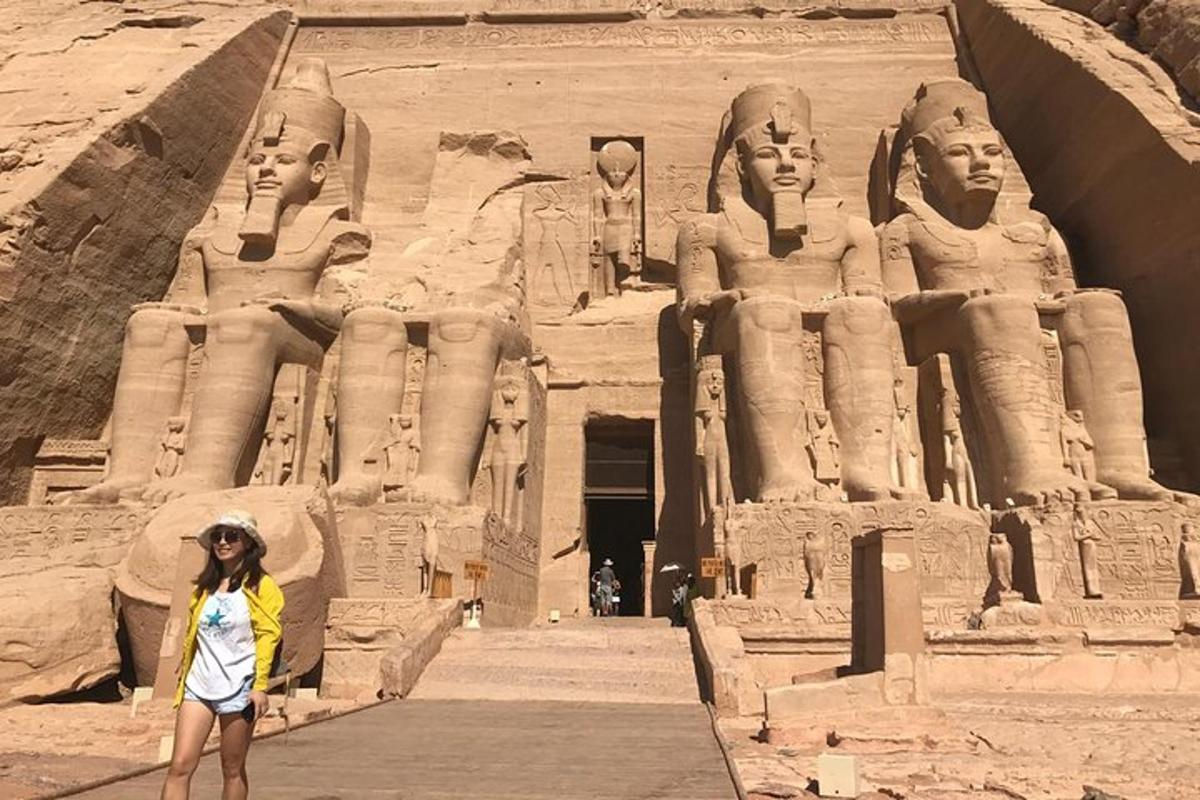a woman is standing in front of anaraoh