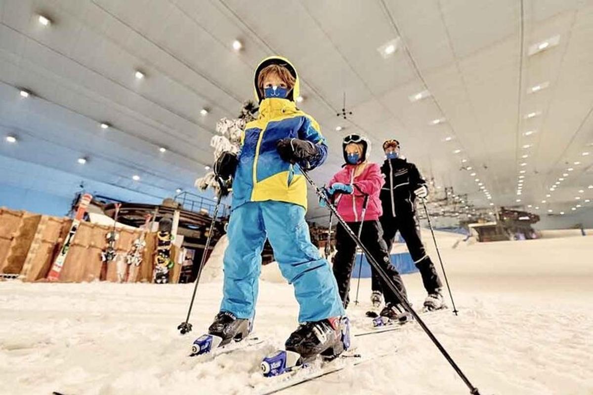a group of people on skis in the snow