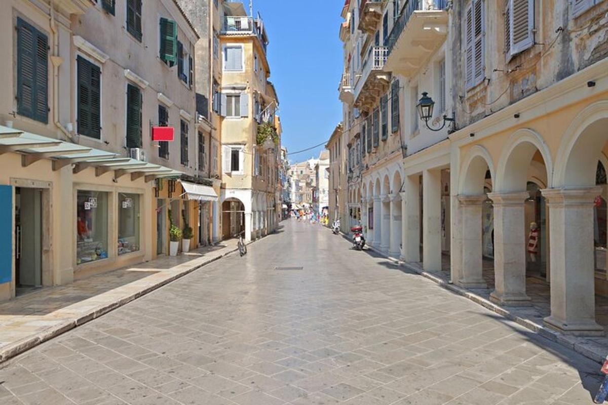 an empty street in a city with buildings