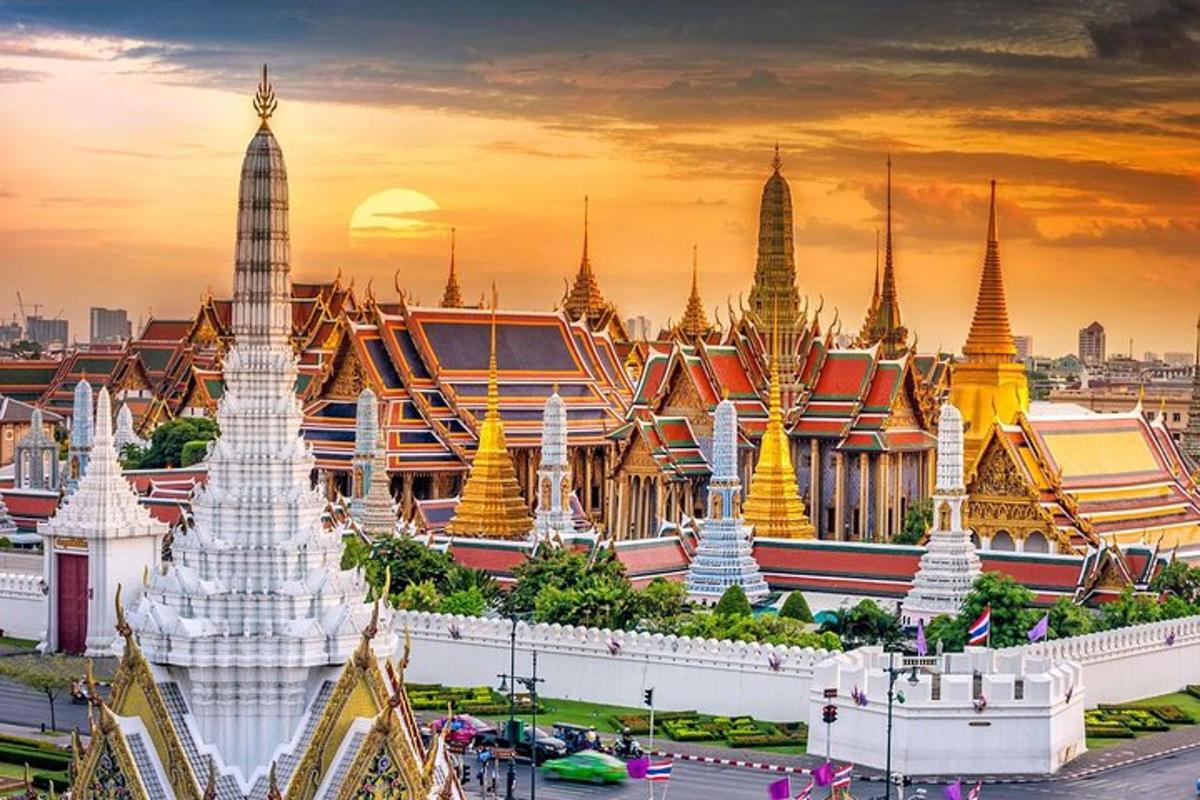 a group of buildings with spires in a city