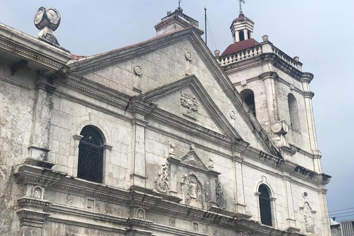 an old building with a clock on top of it
