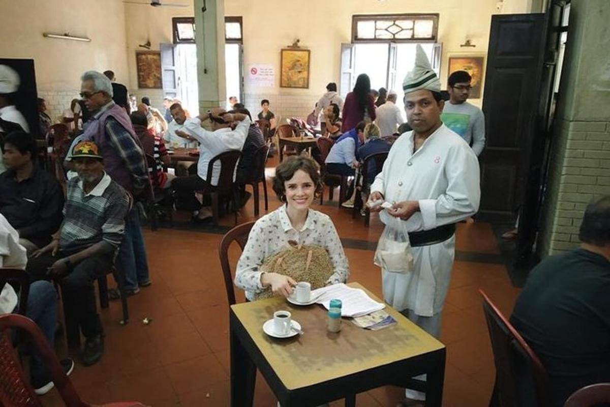 a man and a woman sitting at a table in a restaurant