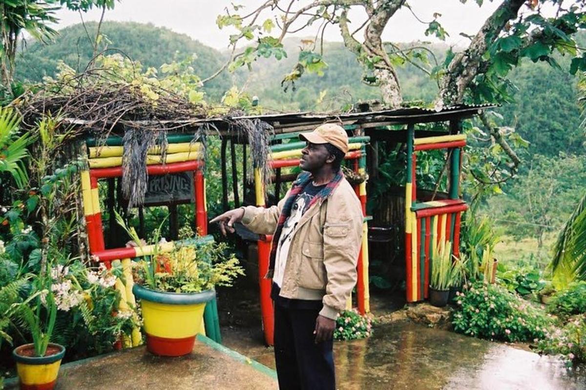 a man standing in front of a flower shop