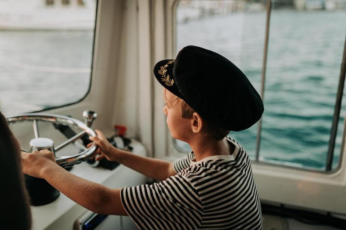 a woman in a hat is driving a boat