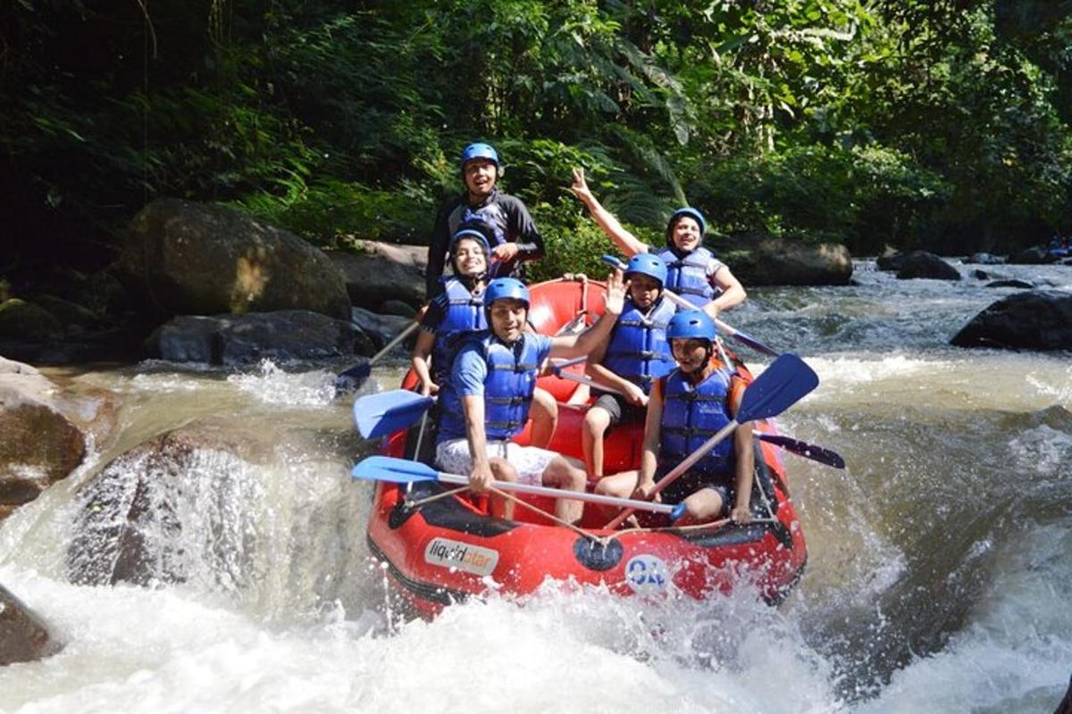 a group of people on a raft in a river