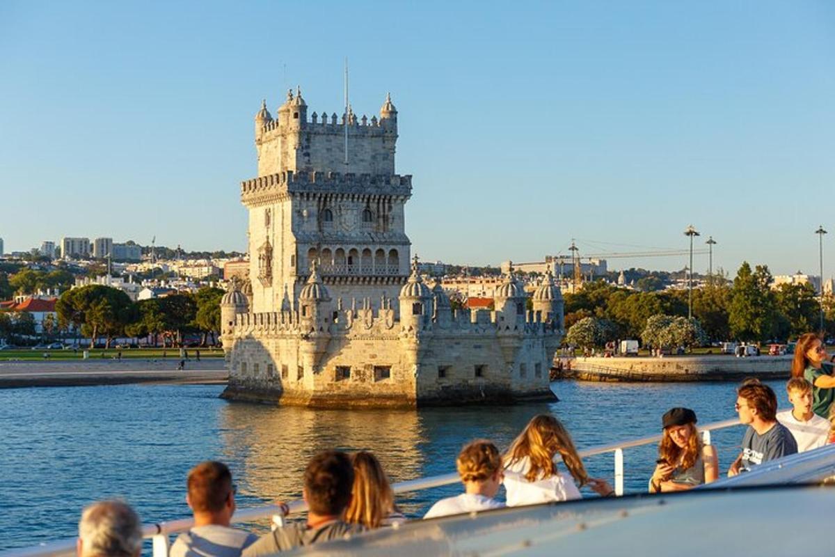 people on a boat in front of a castle in the water