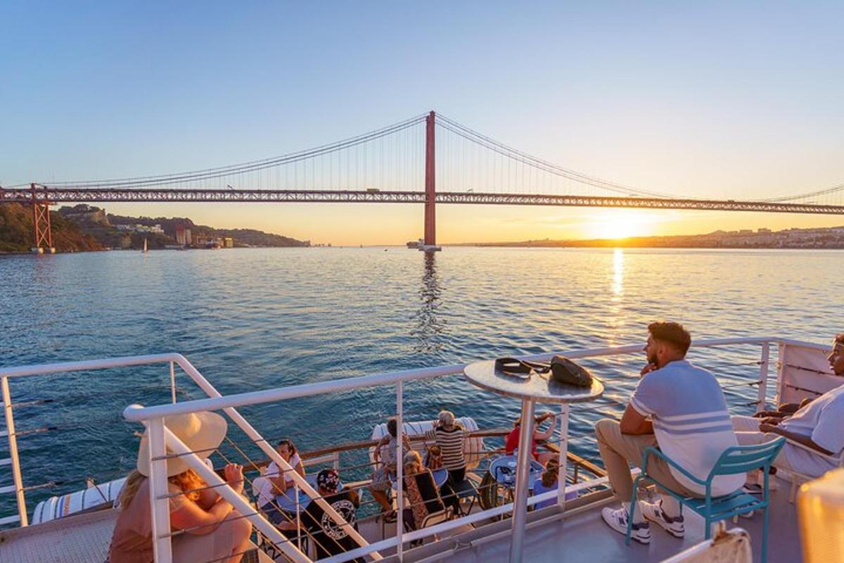 a group of people on a boat in the water with a bridge