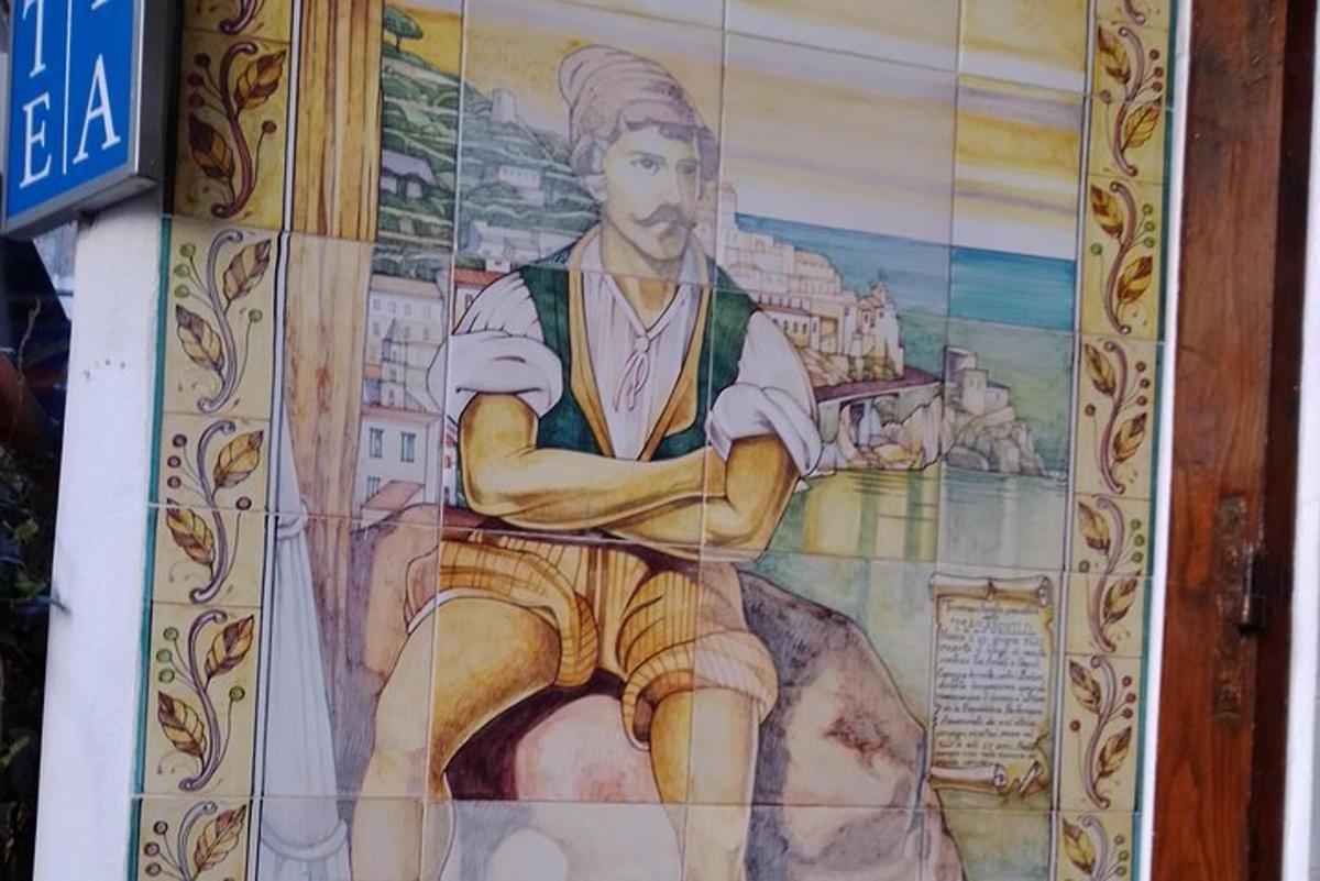 un dipinto di un uomo sul lato di un muro