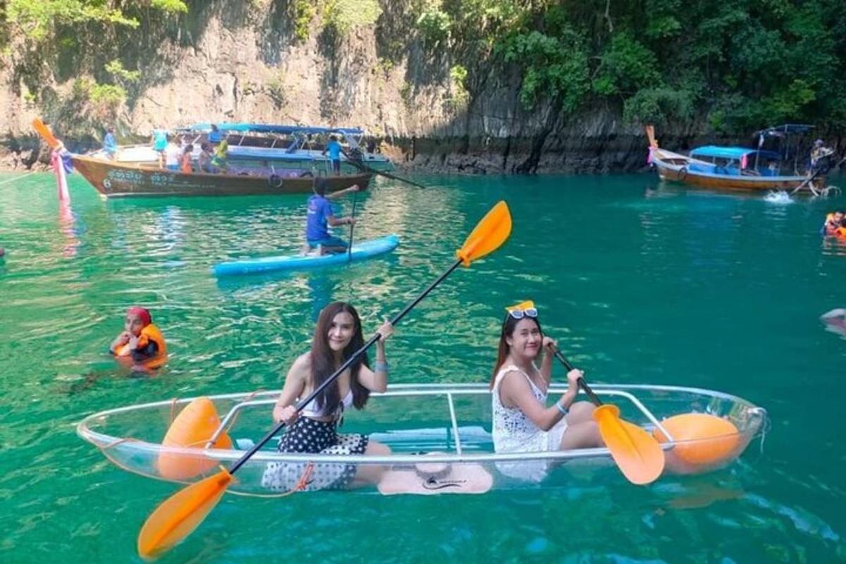 two girls are in a boat in the water