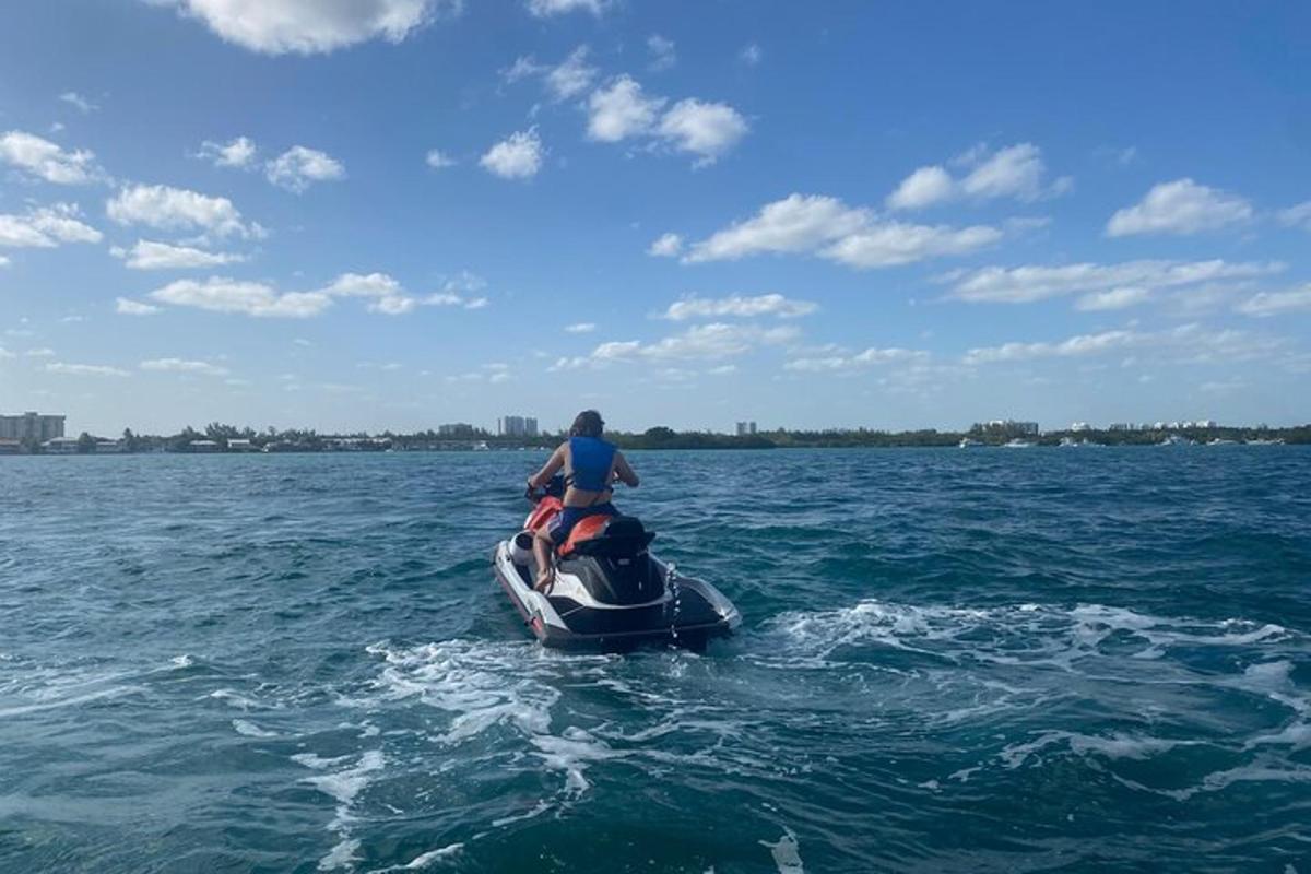 a person on a jet ski in the water