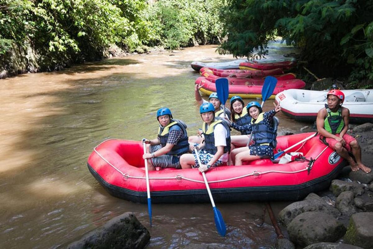 a group of people on a raft on a river