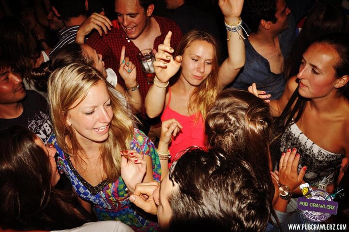a group of people standing in a crowd