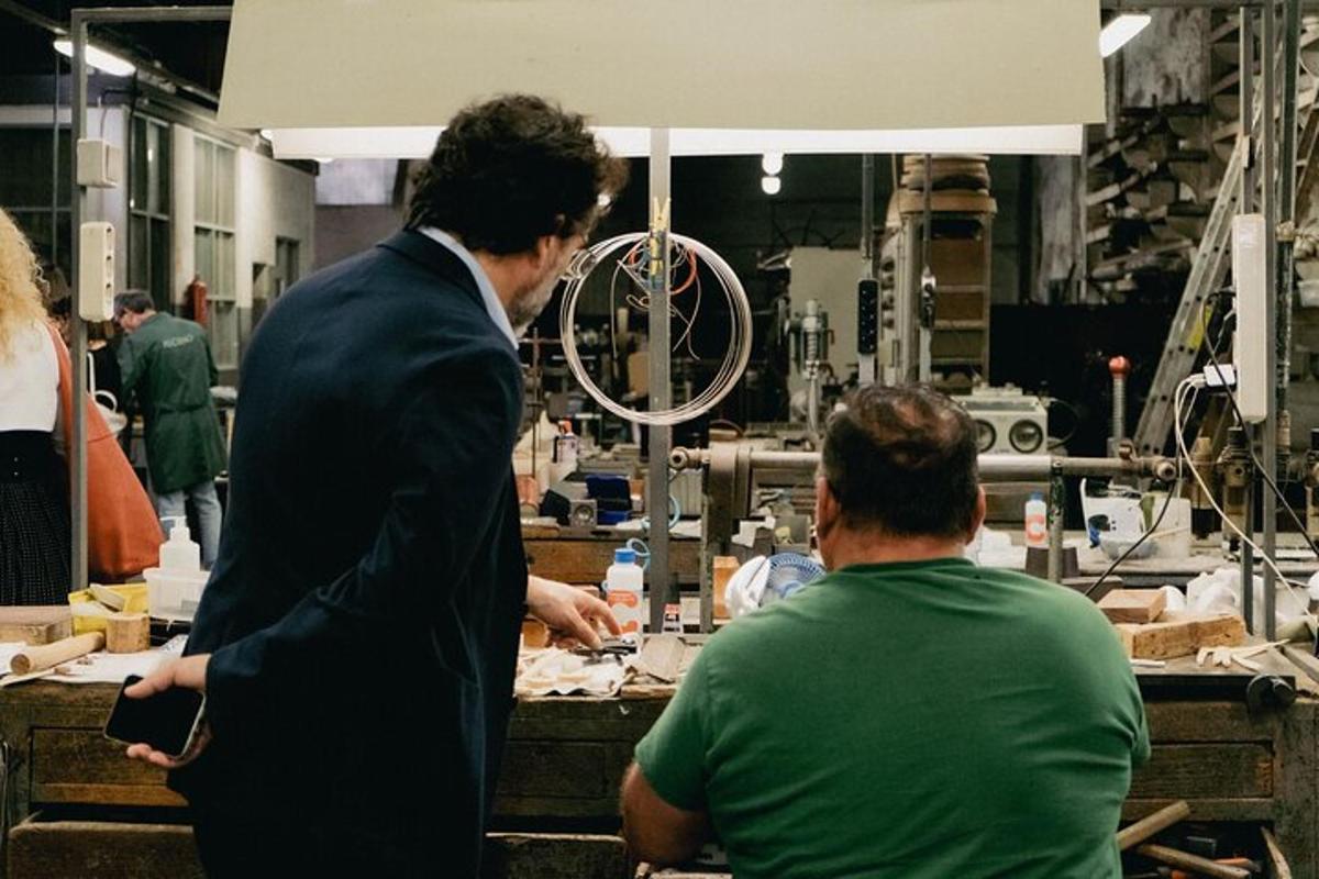 a man and a woman working in a factory