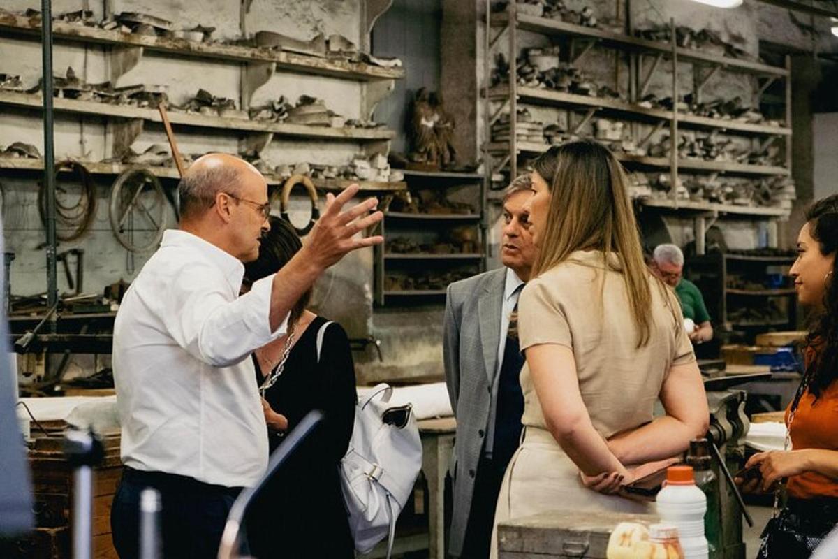 a man talking to a woman in a factory