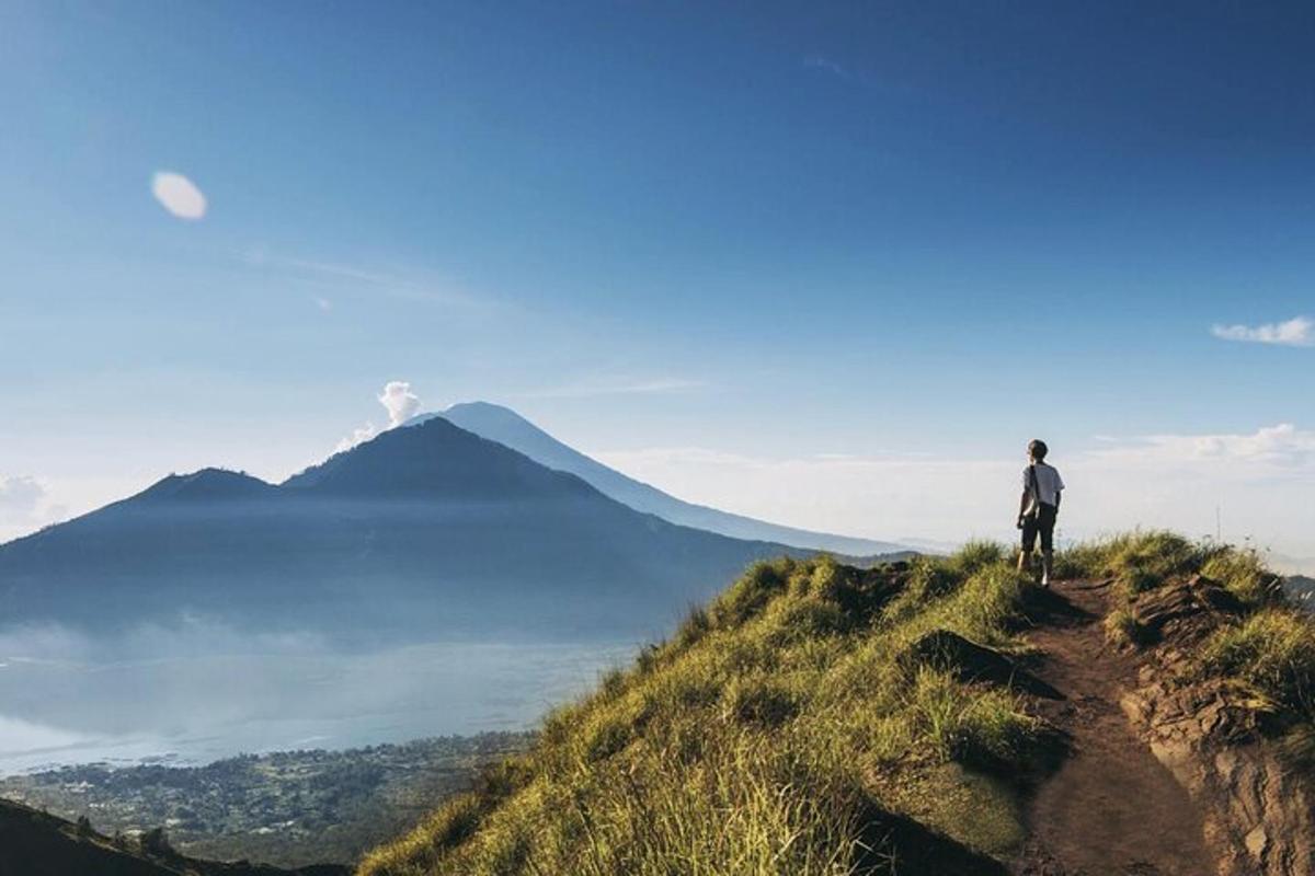 a person standing on top of a mountain
