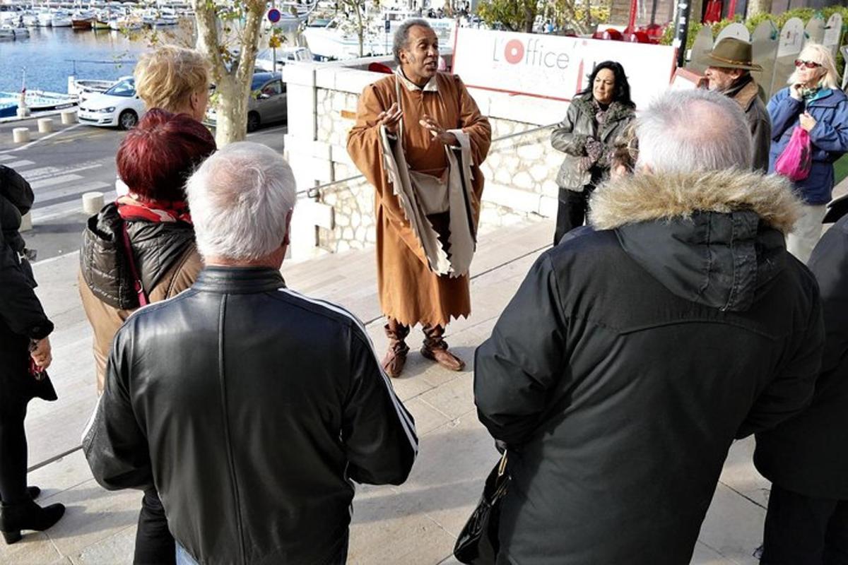 a group of people standing on a sidewalk
