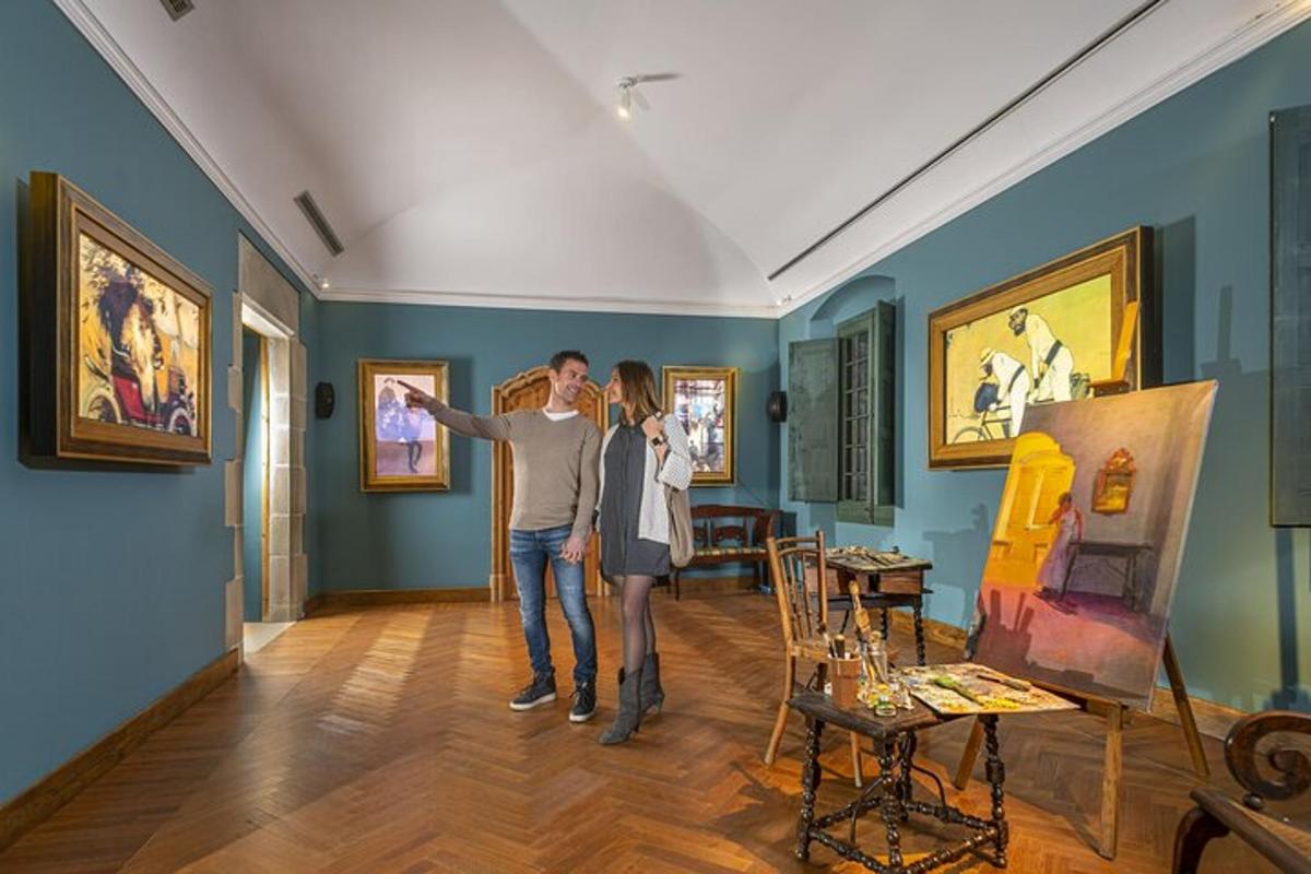 a man and woman looking at a painting in a museum