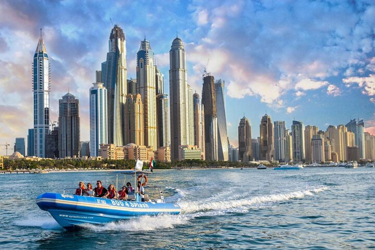 a group of people on a boat in the water with a city