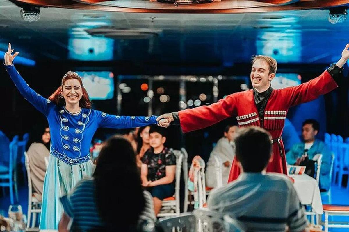 a man and a woman dancing in front of a crowd