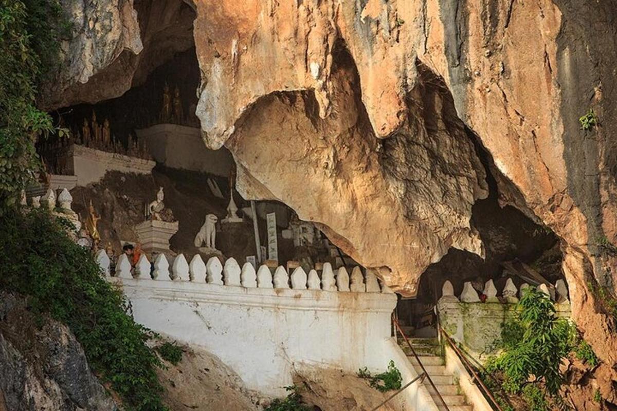 a cave with a temple in a mountain