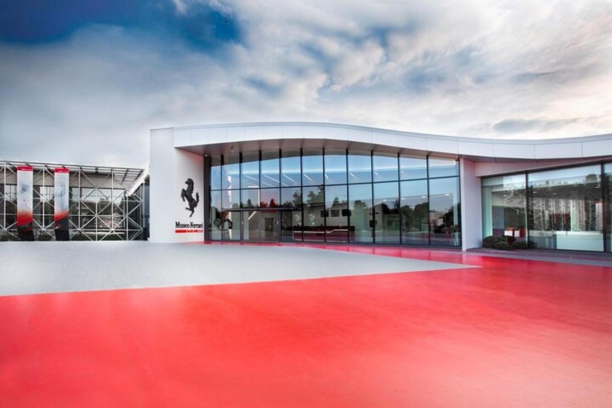 a building with a red floor and a building with windows