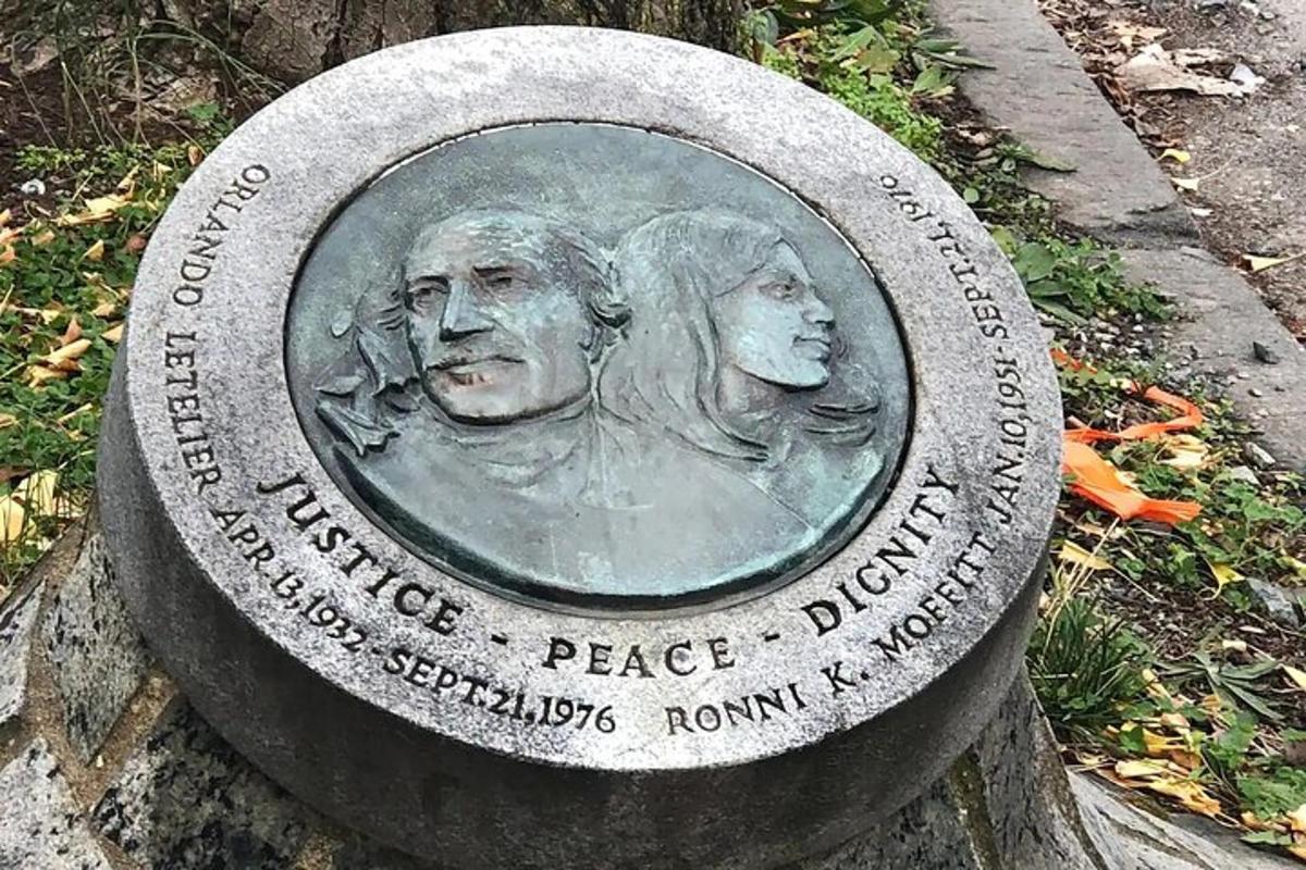 a statue of a man and a woman on a monument