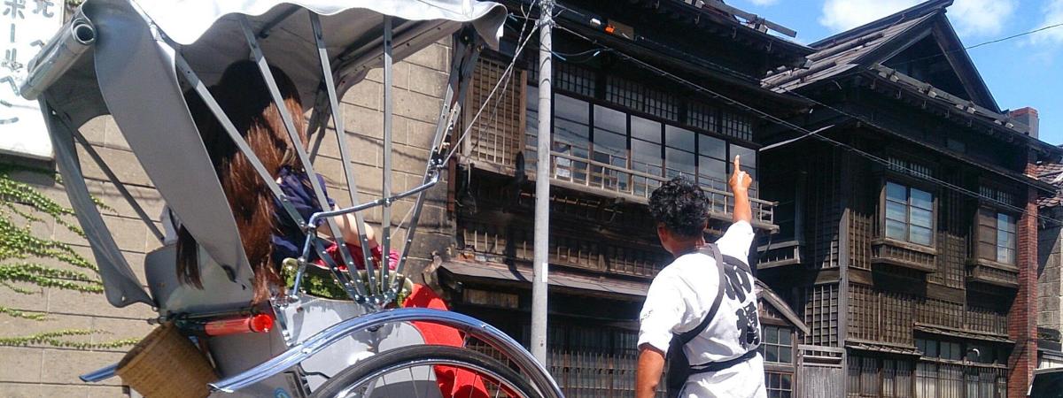 a man standing in front of a building