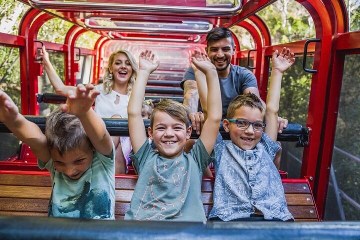 a group of children riding on a roller coaster