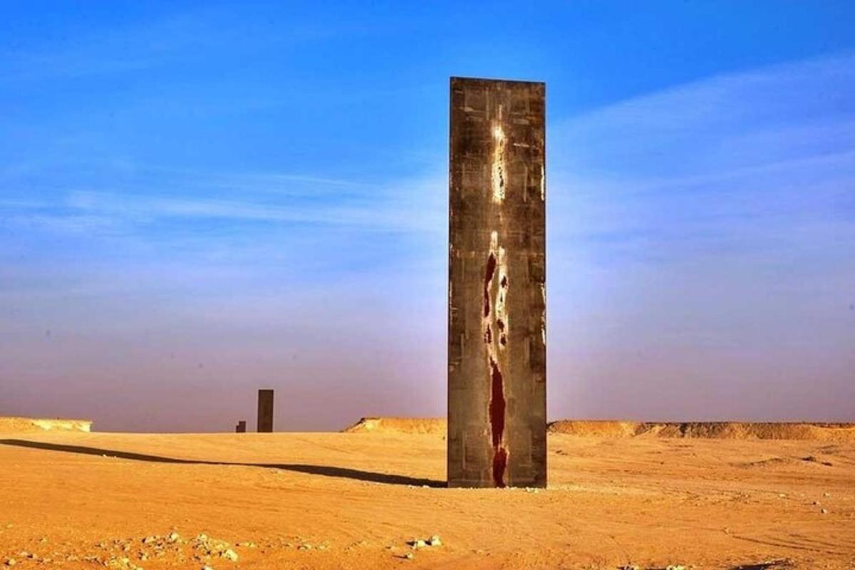 a pole in the middle of a field