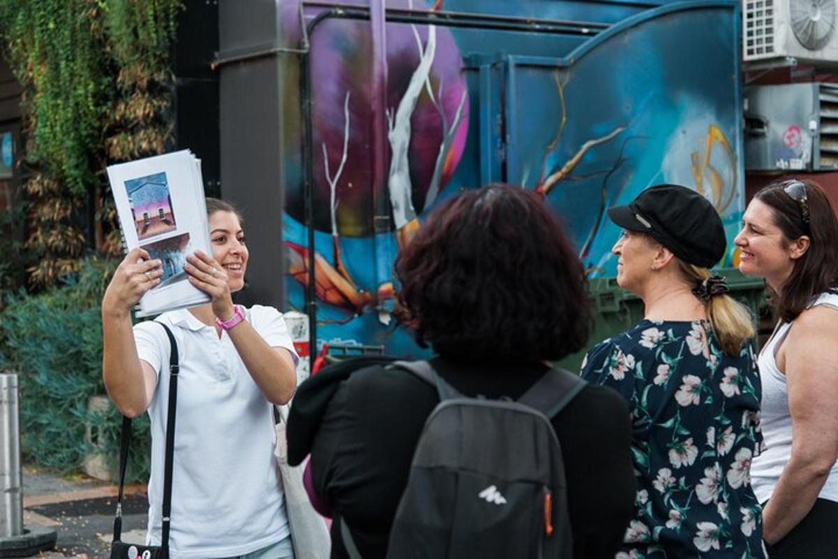 a woman taking a picture of a group of people