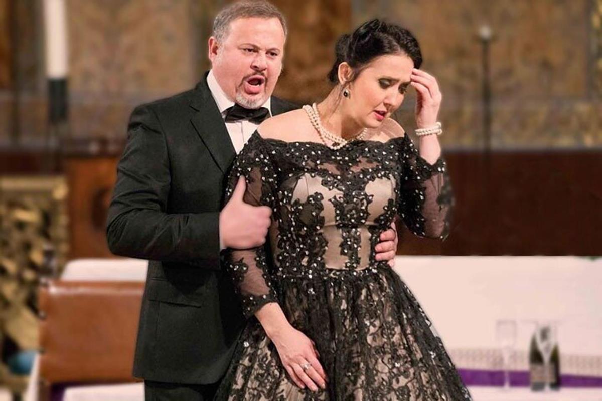 a man and a woman in a black dress