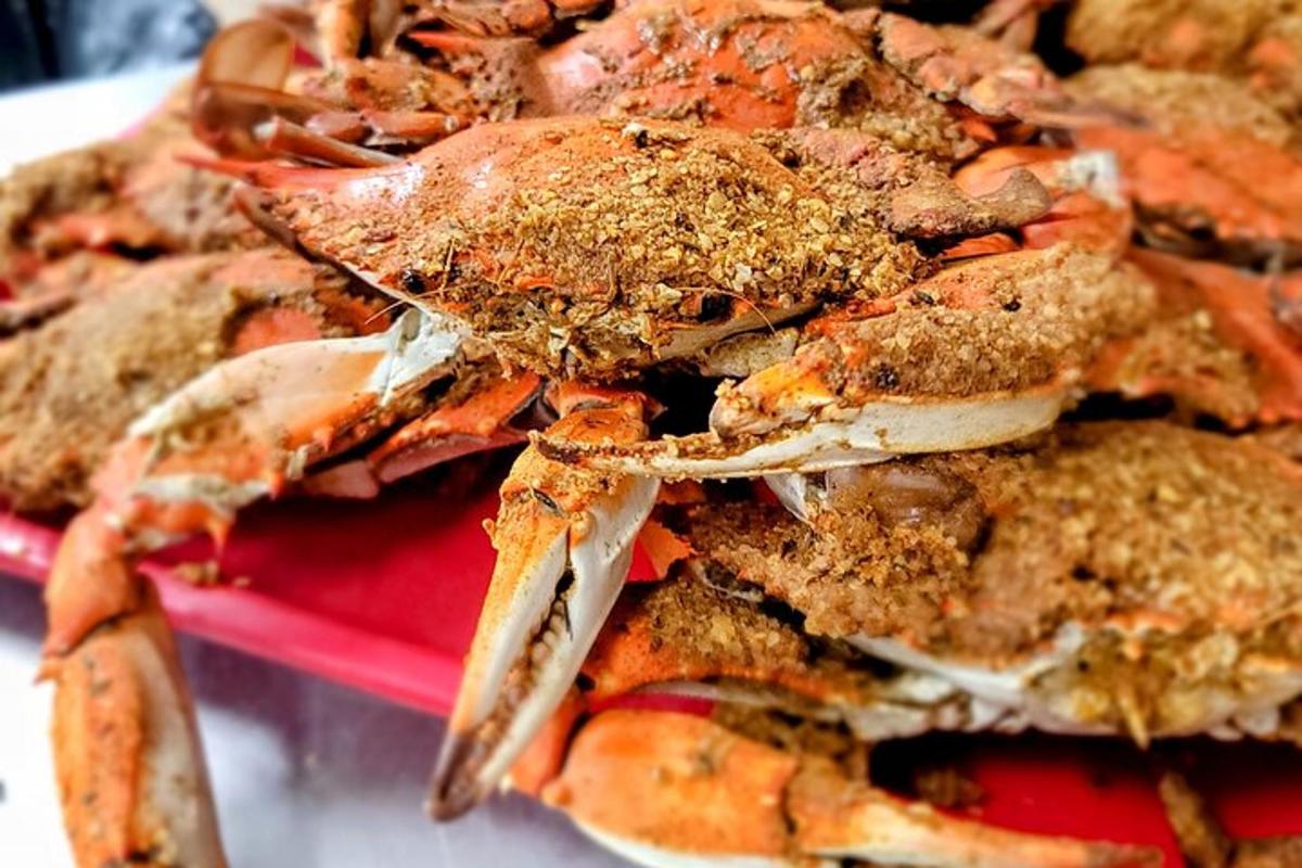 a pile of crabs on a red plate